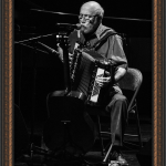 Alan Reid playing accordian